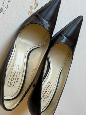 Black leather Coach pumps 7 1/2